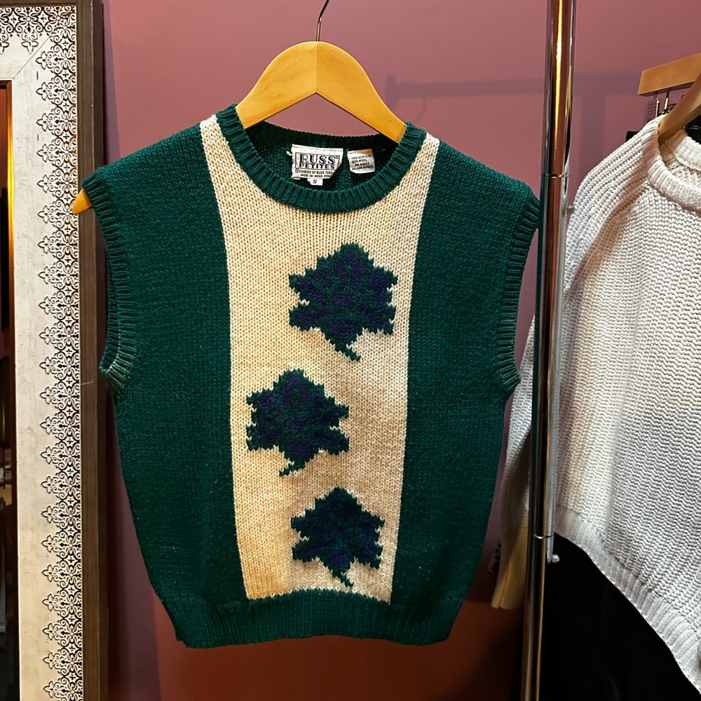 White and green sweater vest with floral design